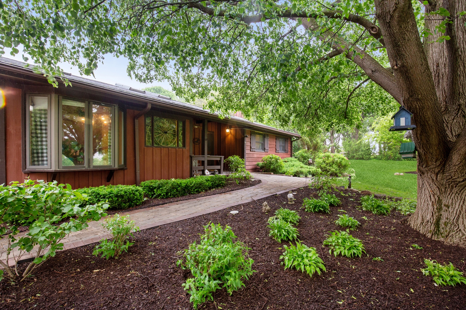 2563 Sheldon Road Grayslake, IL 60046 - Photo 2 of 36 a front view of a house with garden