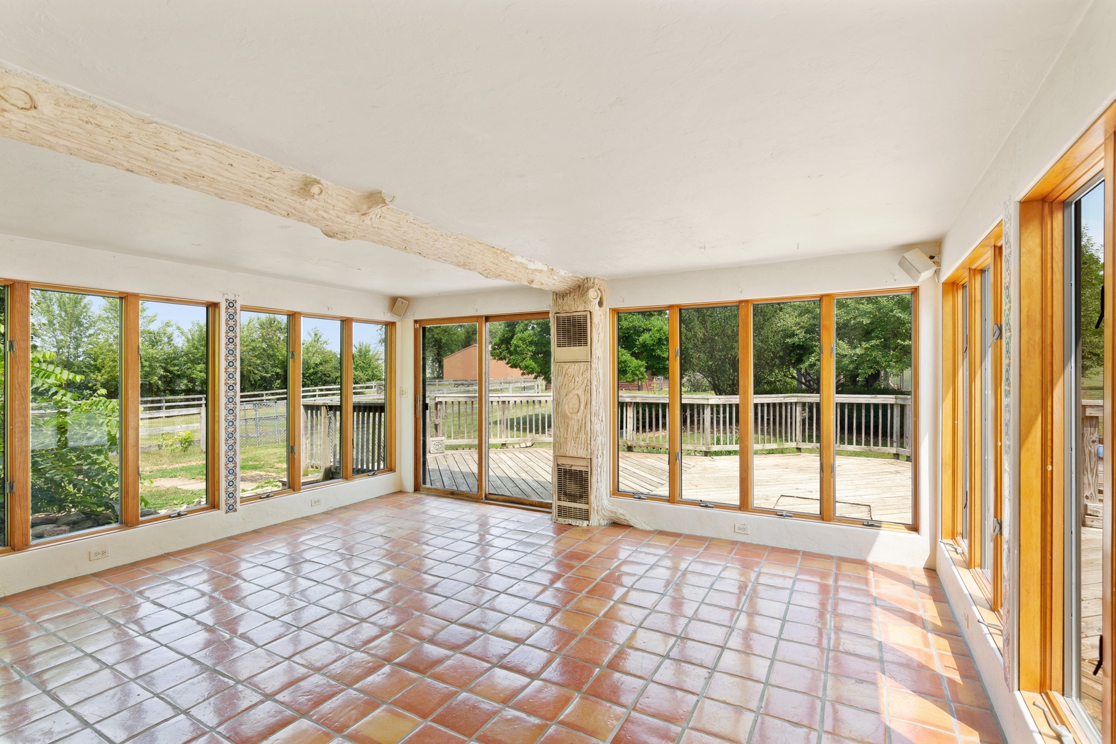 2563 Sheldon Road Grayslake, IL 60046 - Photo 11 of 36 a view of empty room with wooden floor and fan