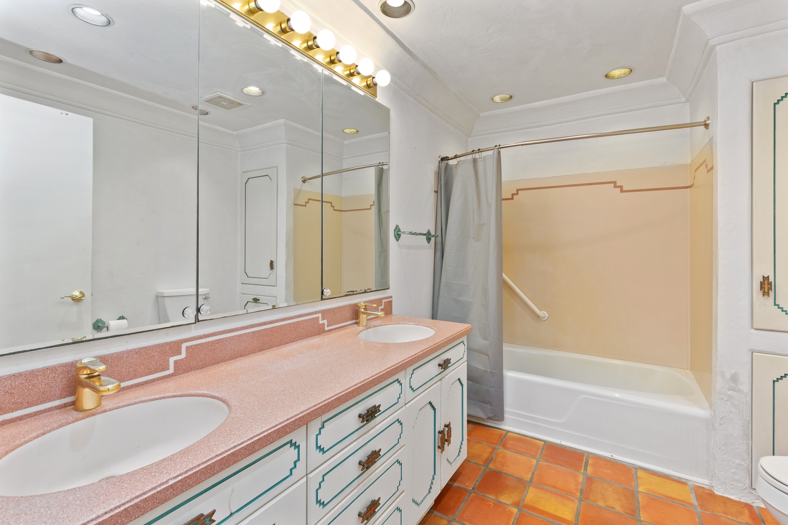 2563 Sheldon Road Grayslake, IL 60046 - Photo 16 of 36 a bathroom with a sink a mirror and a bathtub with shower