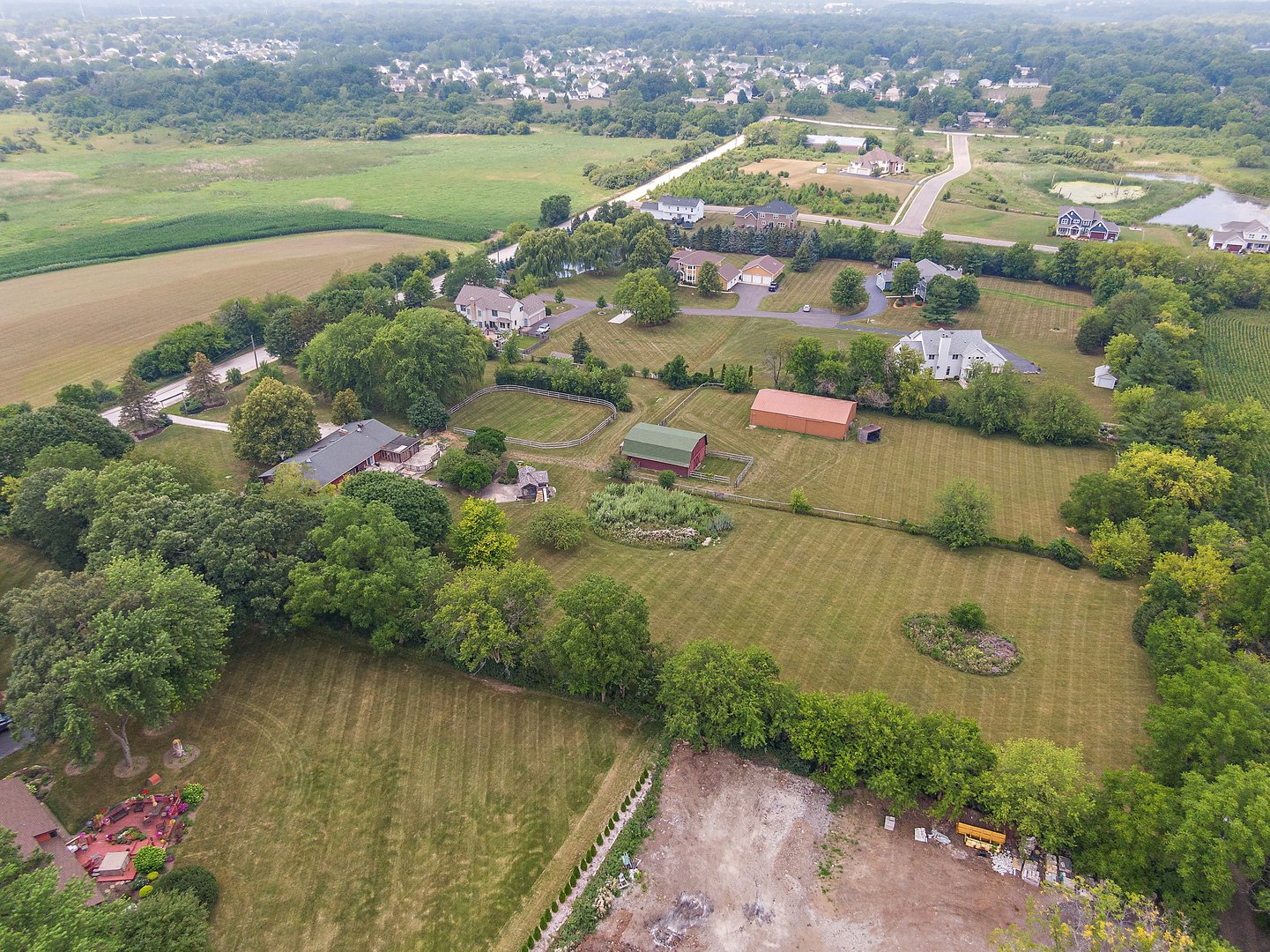2563 Sheldon Road Grayslake, IL 60046 - Photo 31 of 36 an aerial view of residential houses with outdoor space and lake view