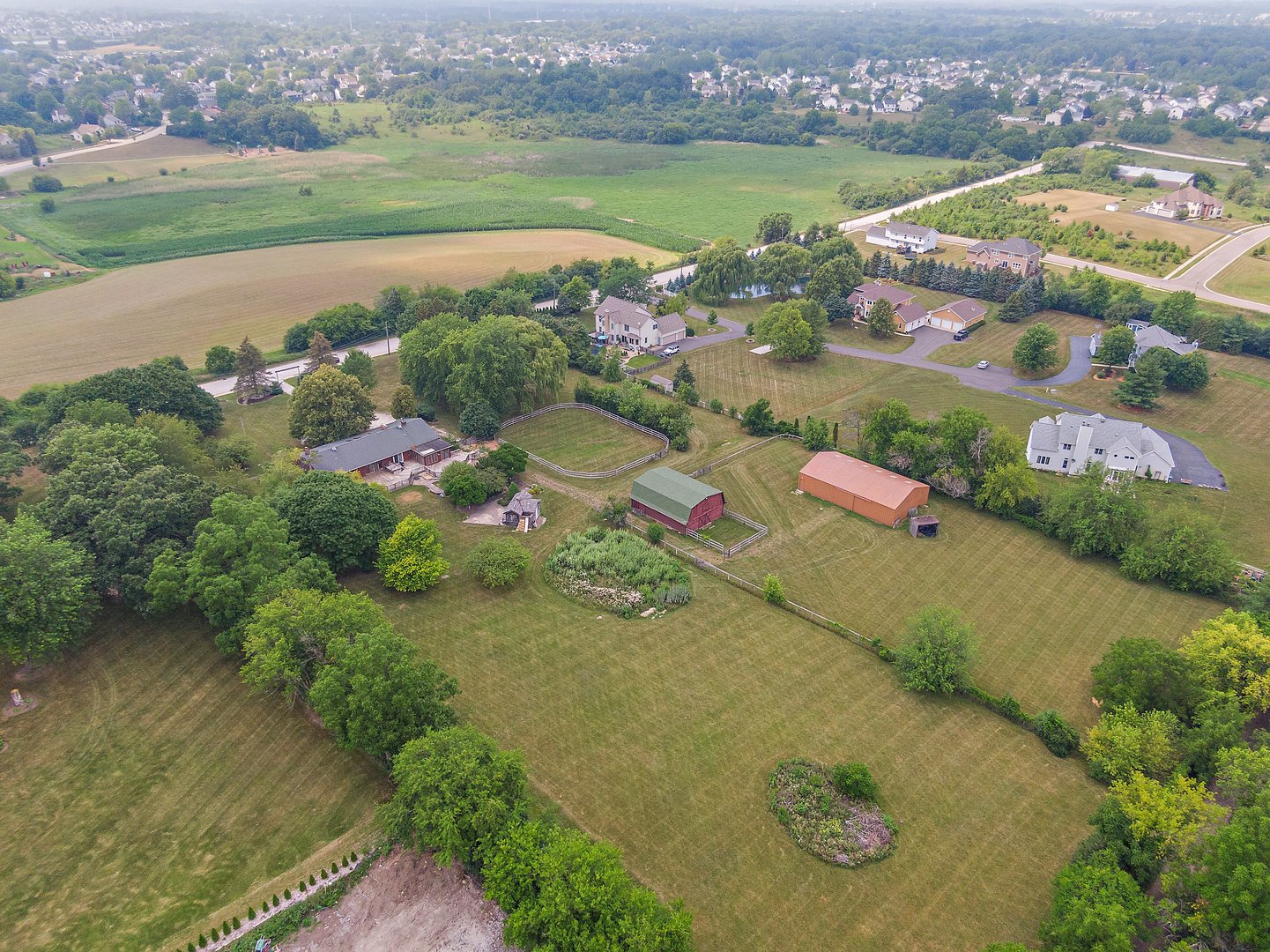 2563 Sheldon Road Grayslake, IL 60046 - Photo 32 of 36 an aerial view of a city with lots of residential buildings lake and ocean view