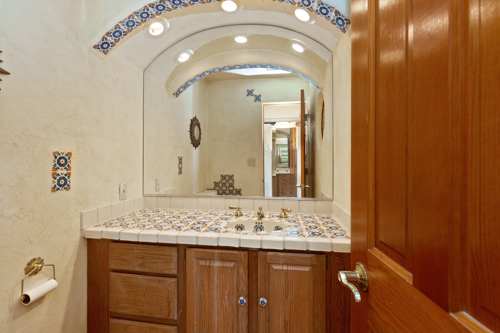 2563 Sheldon Road Grayslake, IL 60046 - Photo 10 of 36 a bathroom with a granite countertop sink a large mirror and a shower