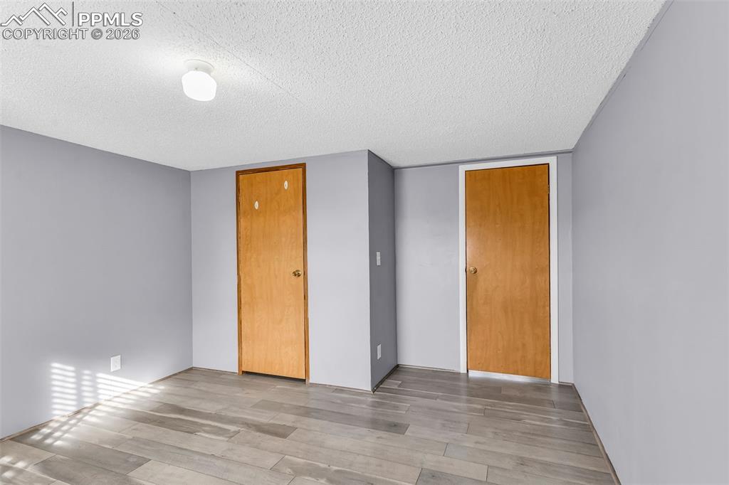 1044 P Street Penrose, CO 81240 - Photo 22 of 48 a view of an empty room with closet and a window