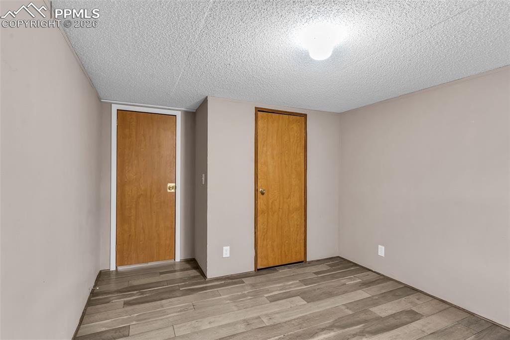 1044 P Street Penrose, CO 81240 - Photo 24 of 48 a view of an empty room with closet and a window