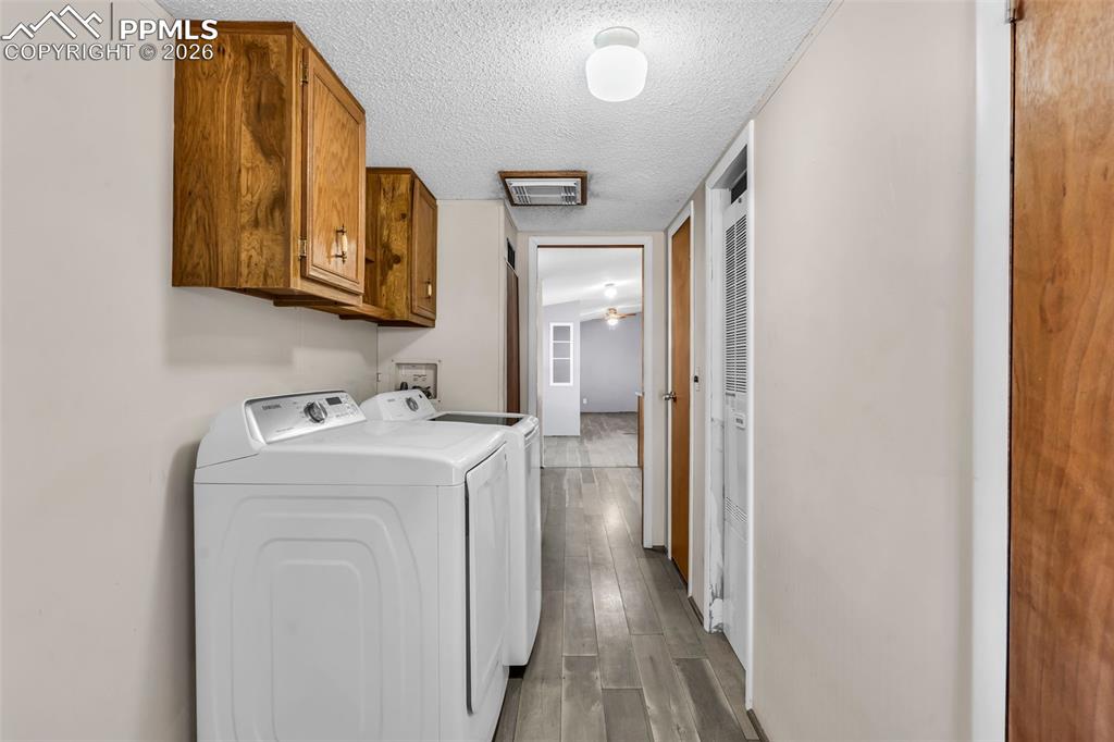 1044 P Street Penrose, CO 81240 - Photo 31 of 48 a utility room with a sink dryer and washer