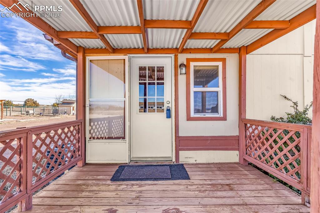 1044 P Street Penrose, CO 81240 - Photo 33 of 48 a porch with view of outdoor space