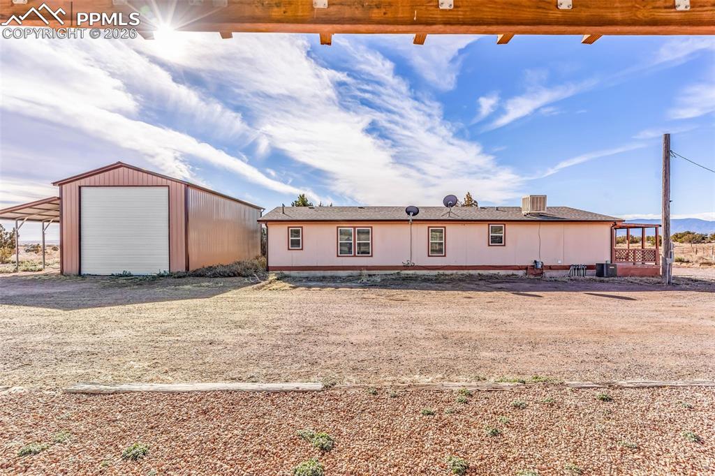 1044 P Street Penrose, CO 81240 - Photo 36 of 48 a view of a house with a yard