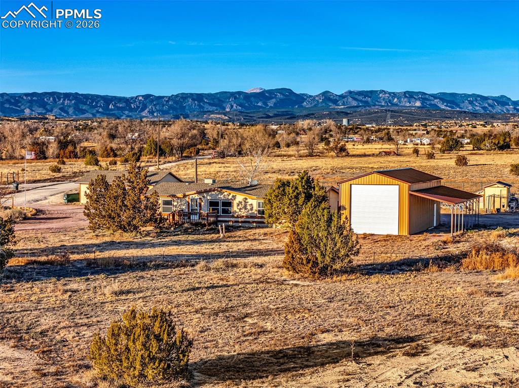 1044 P Street Penrose, CO 81240 - Photo 47 of 48 a view of a house with a ocean view