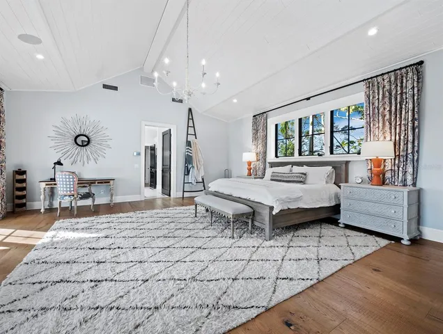 a backyard of a house with lots of green space and fountain