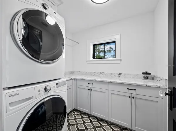 a outdoor space with patio couches and a potted plant