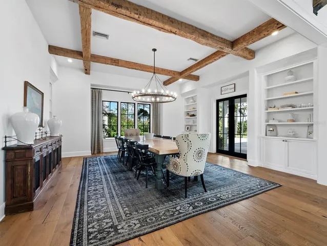a bathroom with a glass shower door and a bathroom
