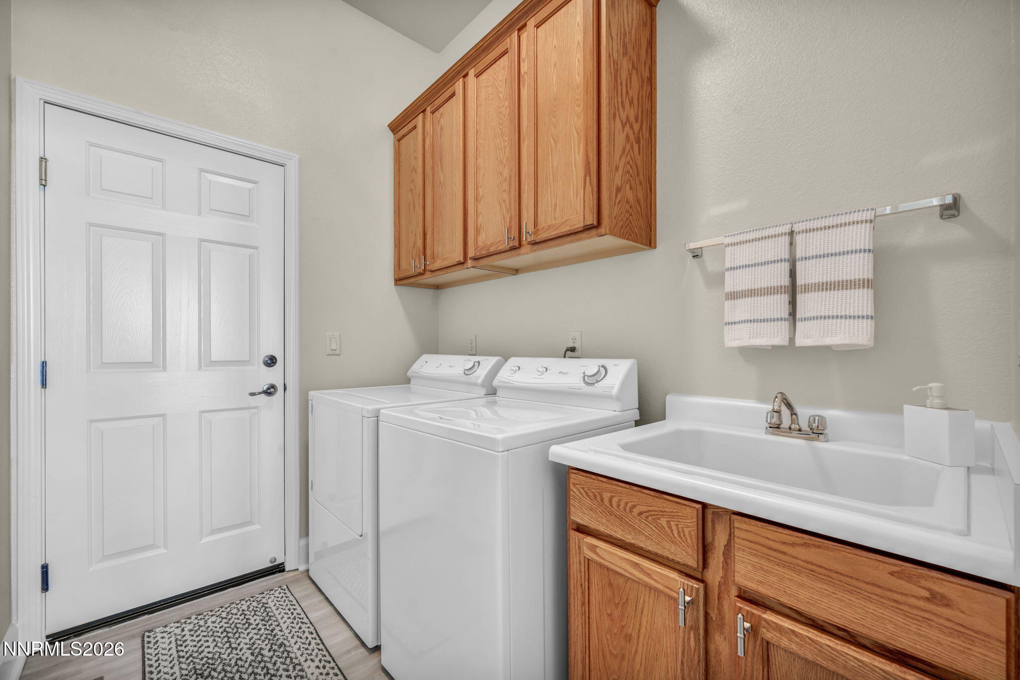 574 Echo Ridge Court Reno, NV 89511 - Photo 46 of 58 a utility room with dryer and washer