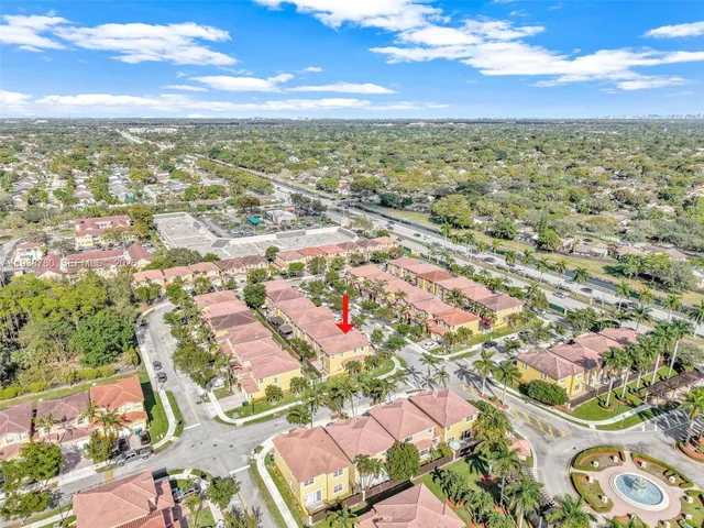 an aerial view of residential building with outdoor space