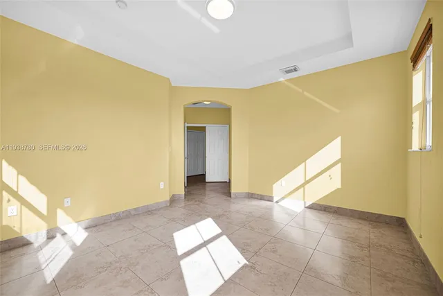 a view of an empty room with window