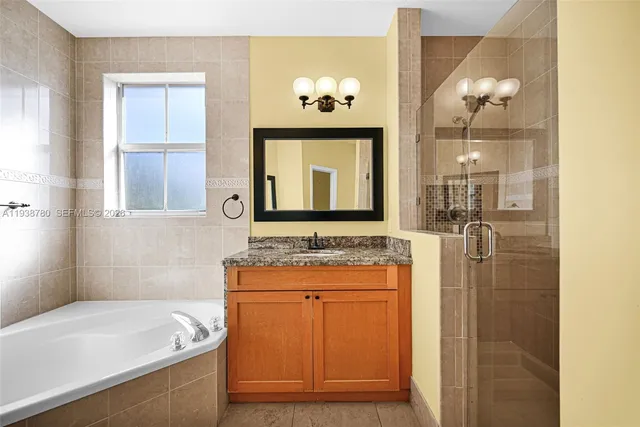 a white toilet sitting next to a white wall