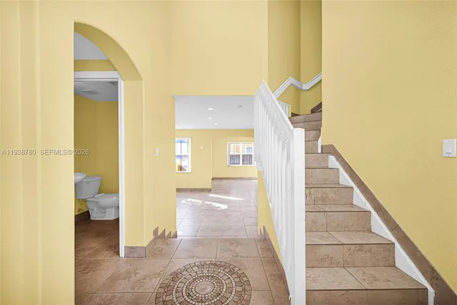 a view of a bathroom from the hallway