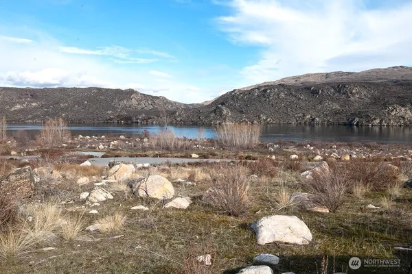 a view of a lake in middle of the town