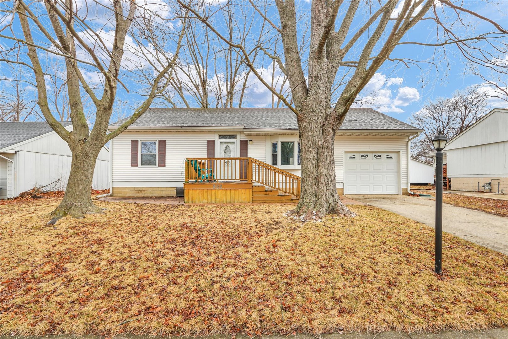 a house with trees in front of it