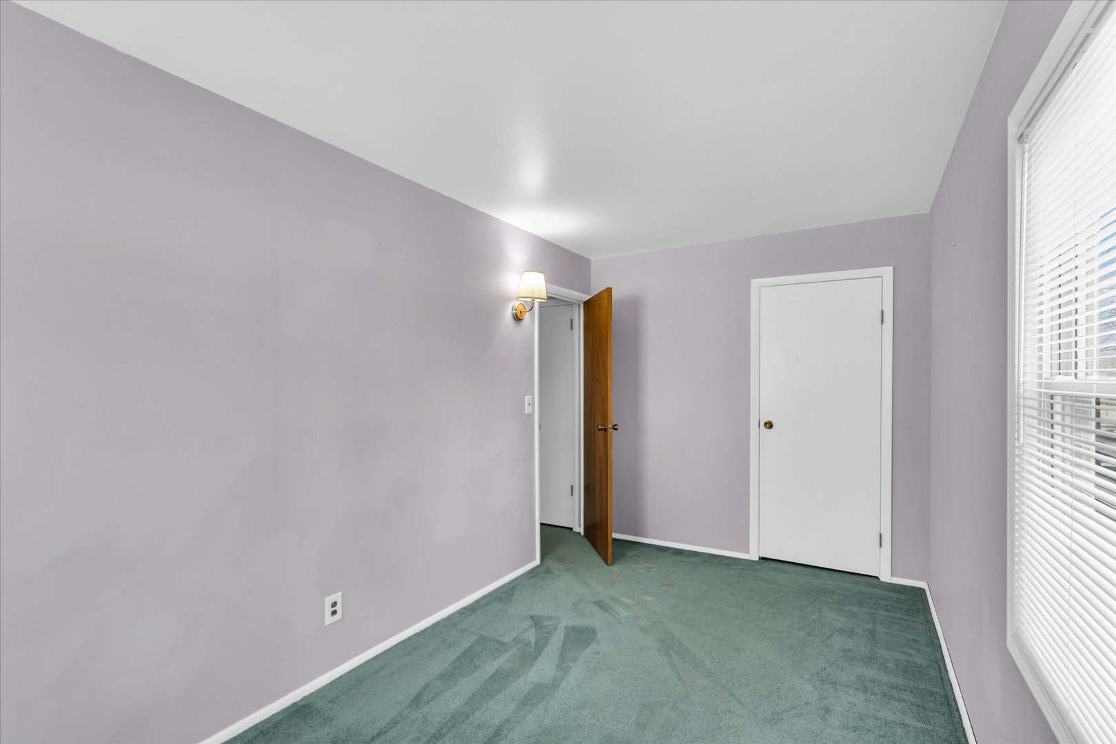 902 Oakcrest Drive Champaign, IL 61821 - Photo 13 of 22 a view of an empty room and a window