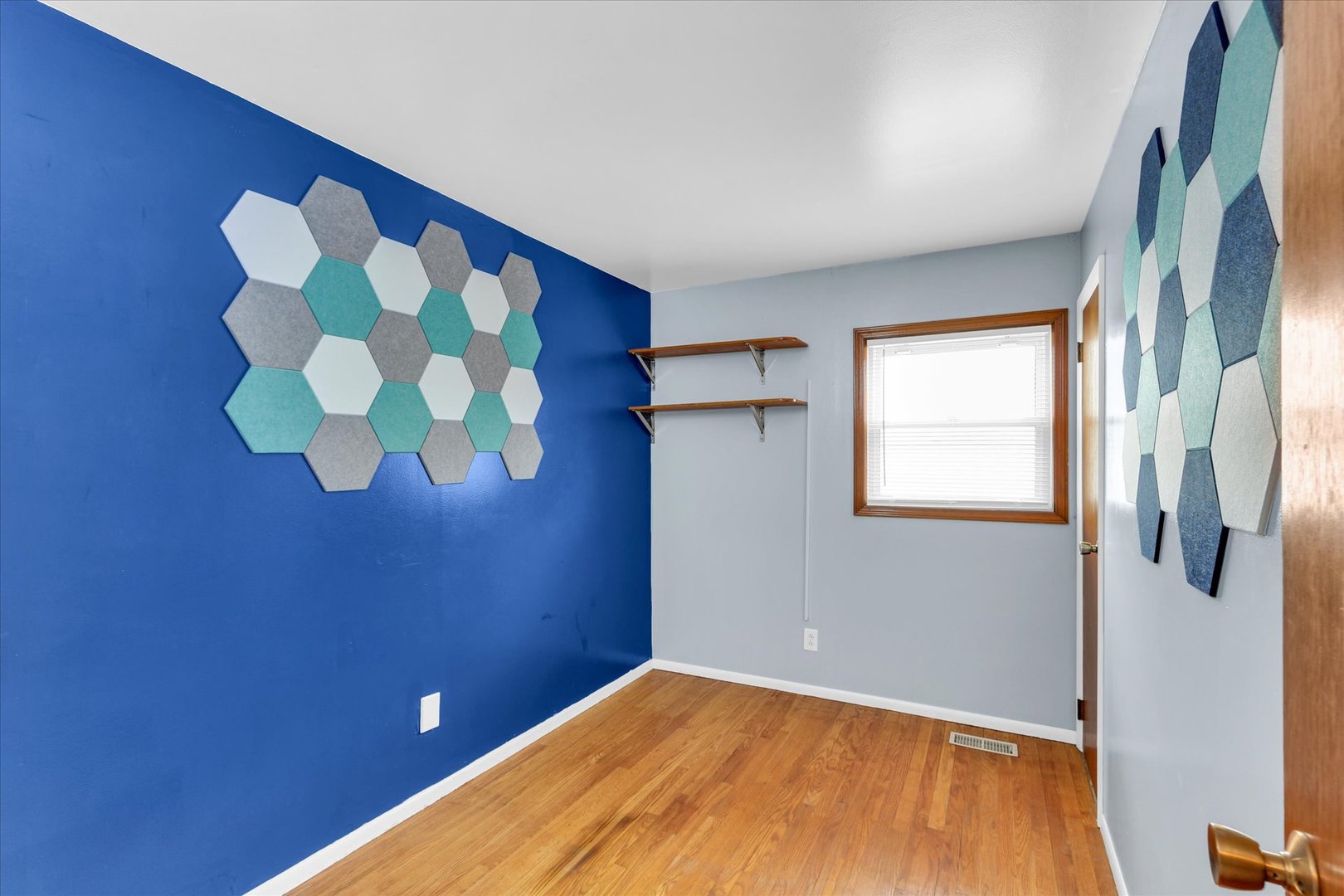 902 Oakcrest Drive Champaign, IL 61821 - Photo 10 of 22 a view of an empty room with a window