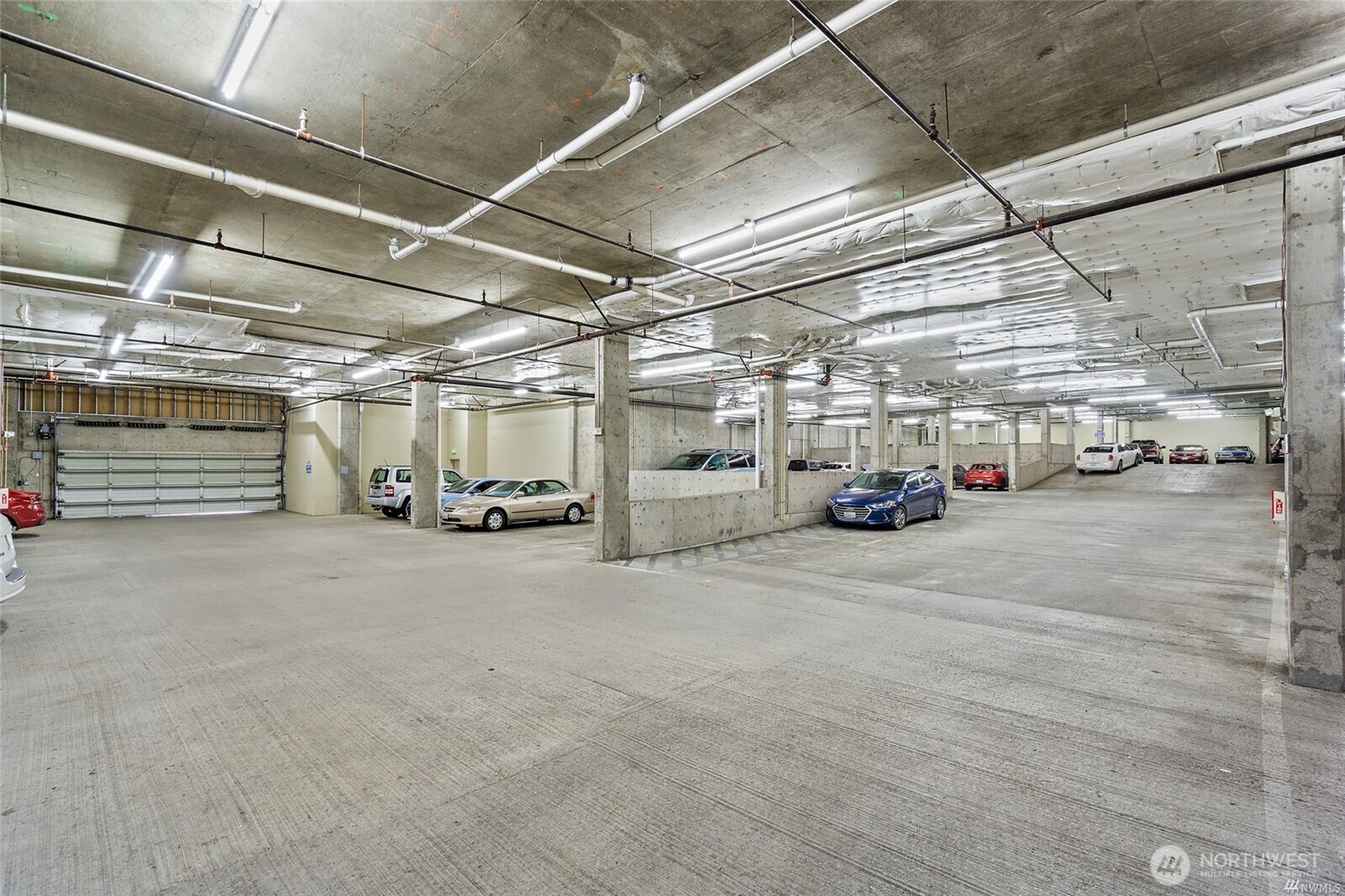 2824 Grand Avenue, Unit 603 Everett, WA 98201 - Photo 18 of 26 a view of parking garage with cars