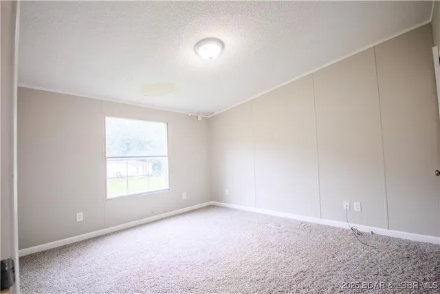 $179,990 | 39 Walnut Dale Lane, Sunrise Beach, MO 65079