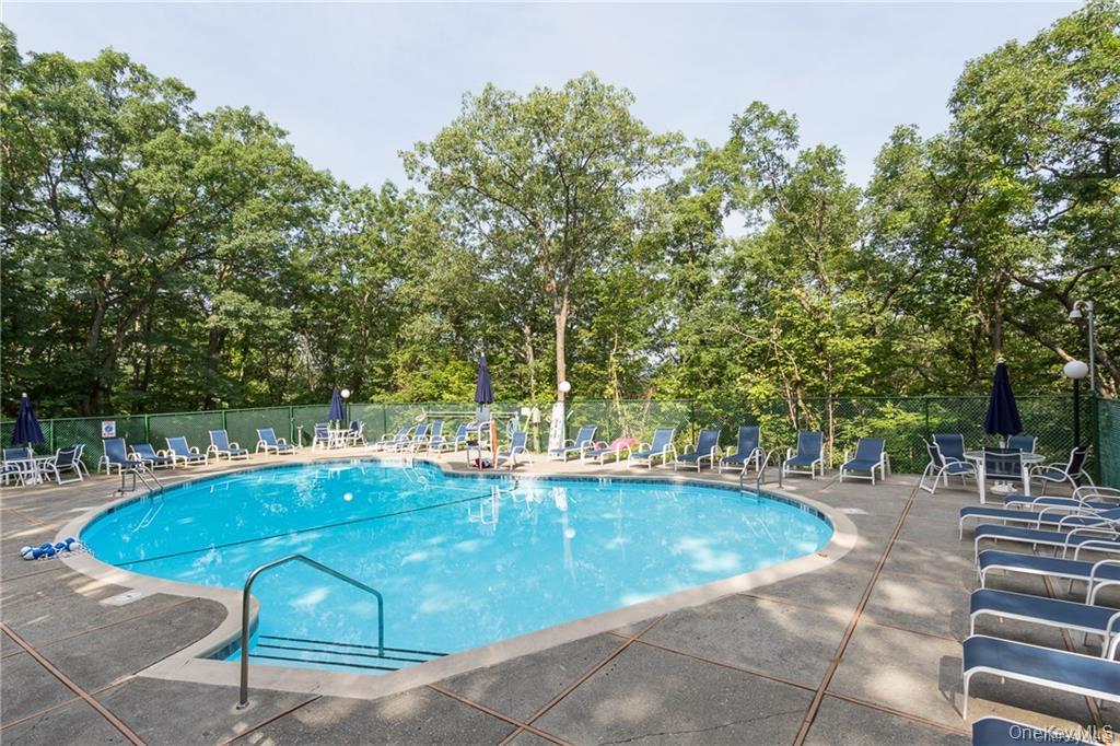 150 Overlook Avenue, Unit 2K Peekskill, NY 10566 - Photo 21 of 26 a view of a swimming pool with a patio