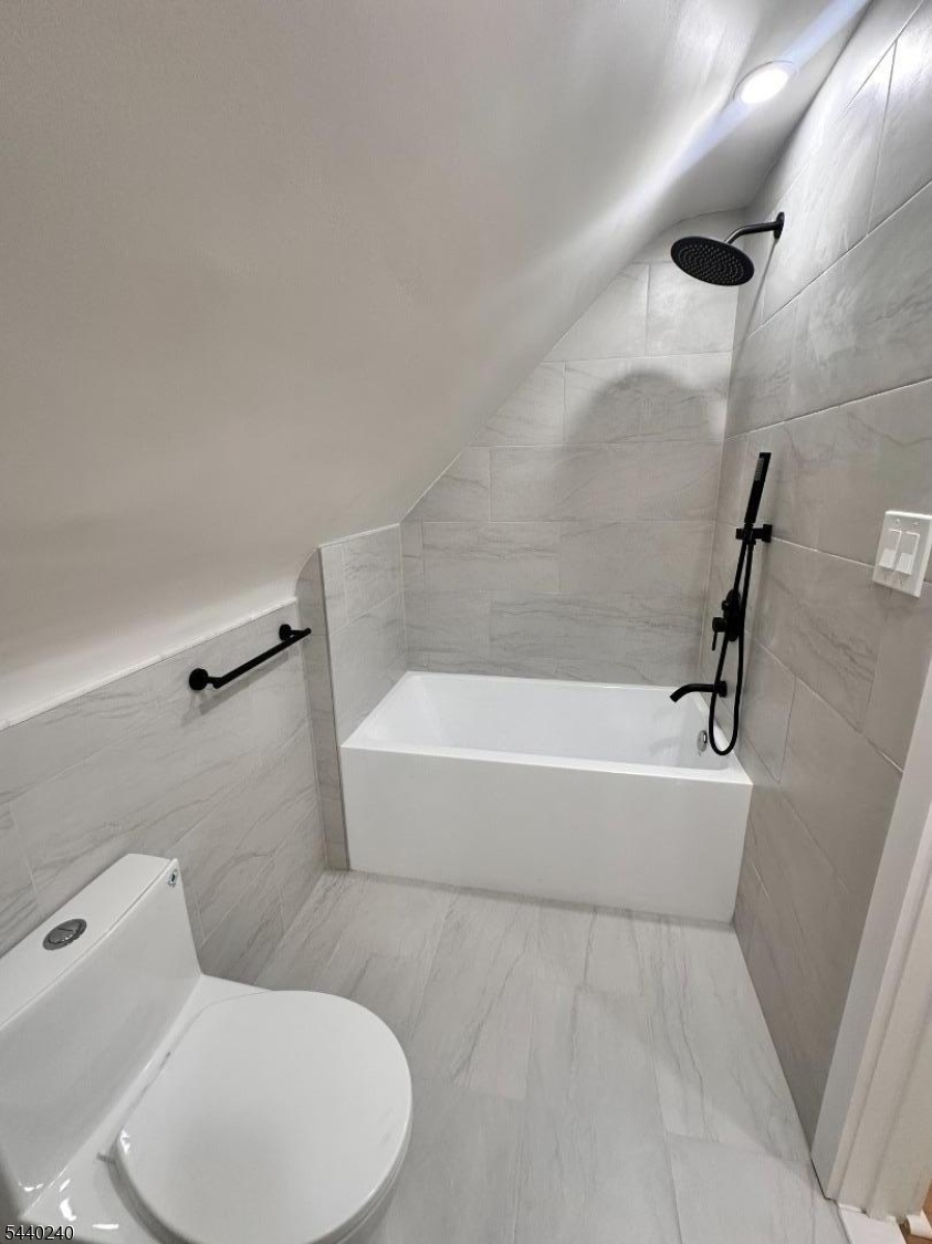 10 Mountain Place Montclair, NJ 07043 - Photo 15 of 21 a bathroom with a toilet and a bathtub
