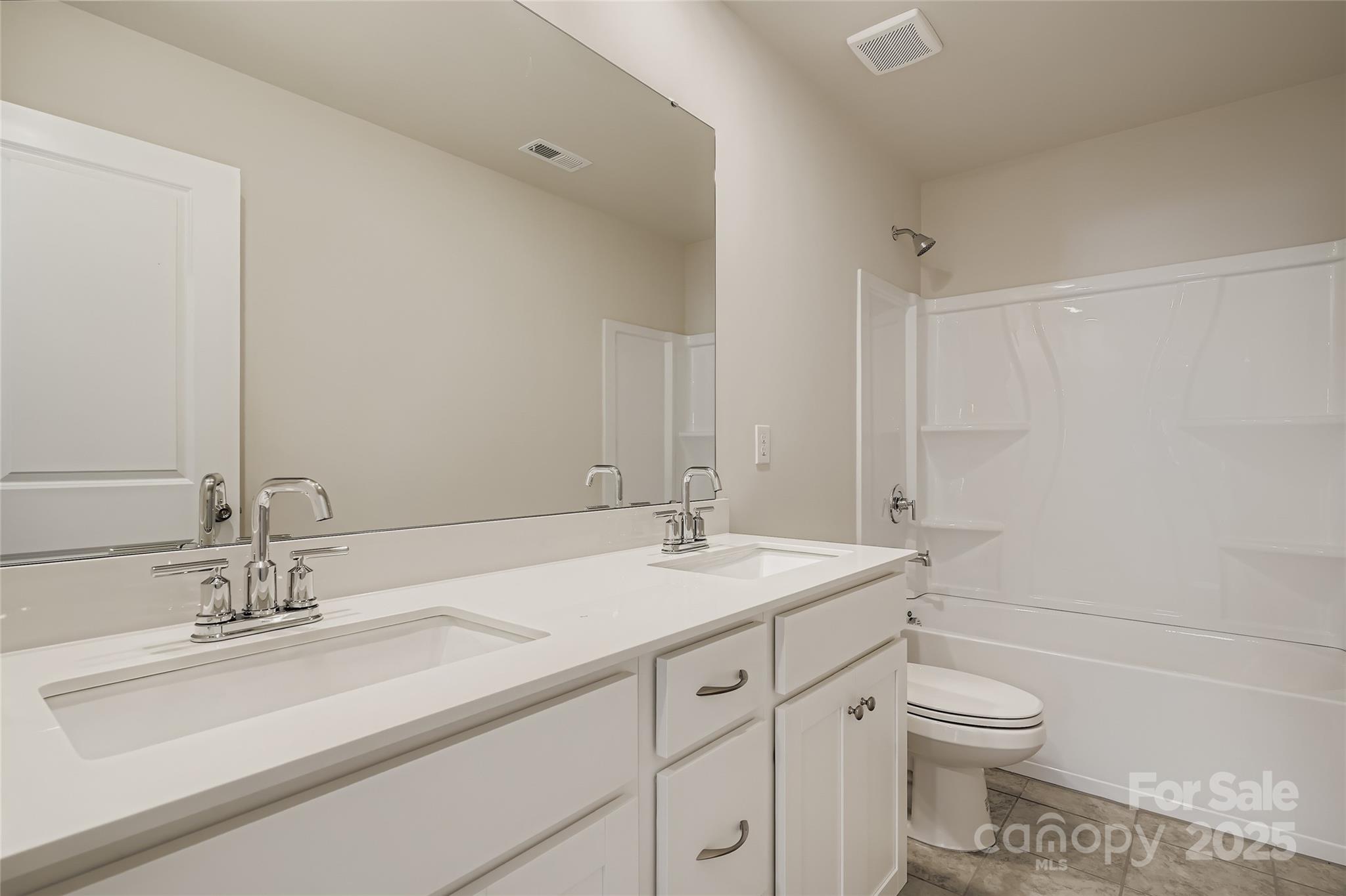 4345 Shimmering Stone Way Maiden, NC 28650 - Photo 11 of 13 a bathroom with a sink toilet and shower