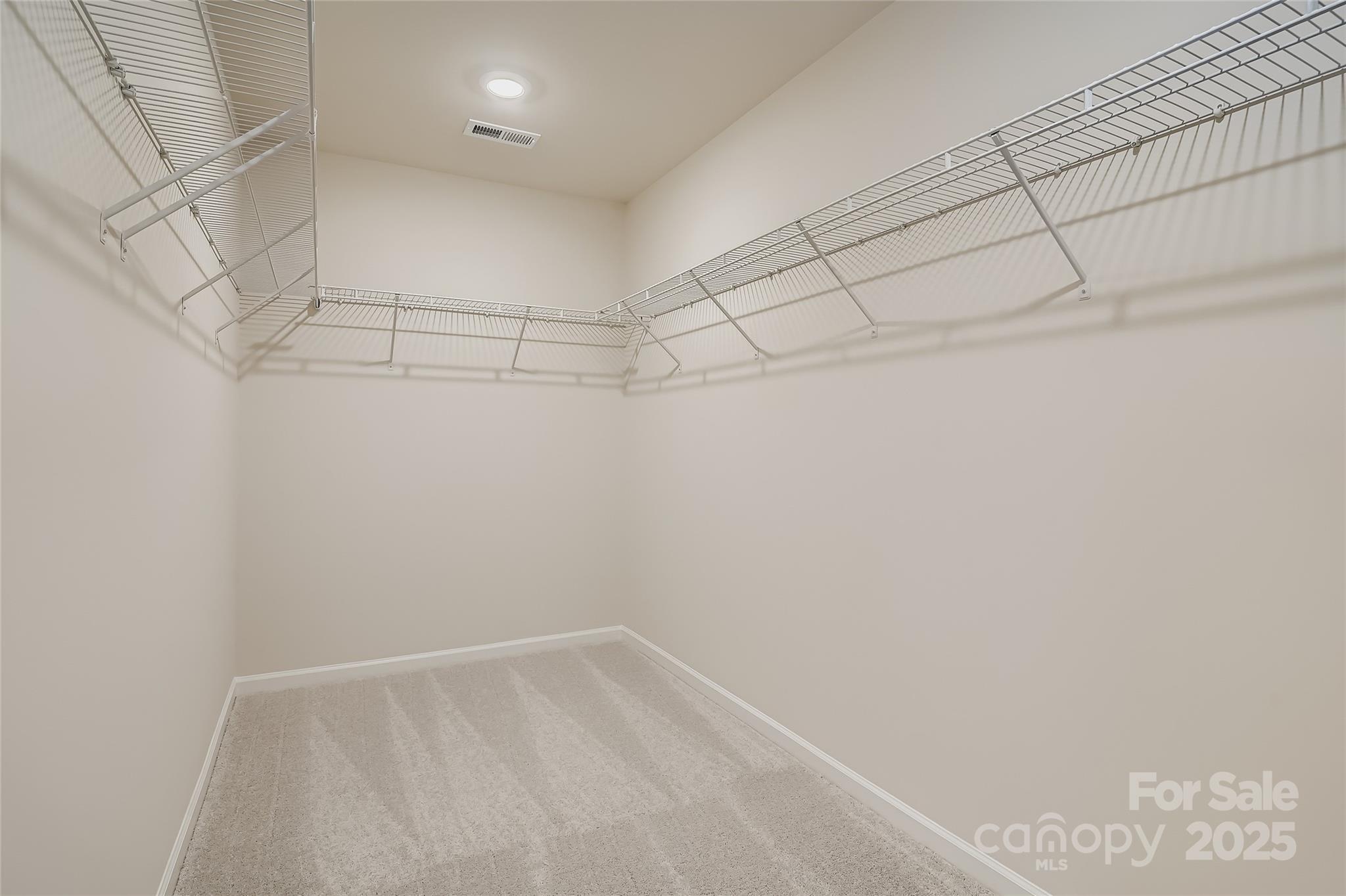 4345 Shimmering Stone Way Maiden, NC 28650 - Photo 8 of 13 a view of a room with racks on the wall