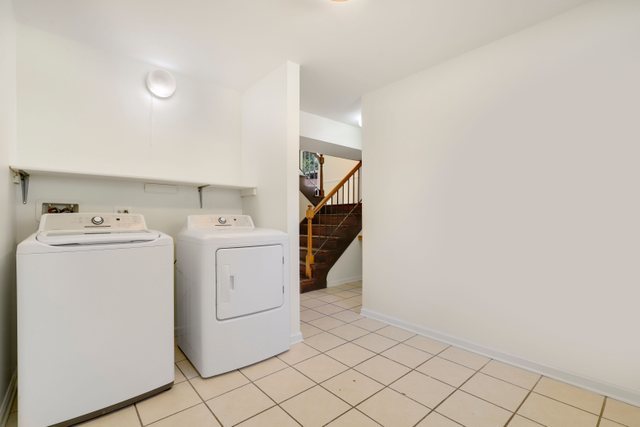 2105 Sutherland Place Hoffman Estates, IL 60169 - Photo 12 of 27 a utility room with dryer and washer