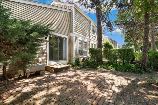 2105 Sutherland Place Hoffman Estates, IL 60169 - Photo 21 of 27 a view of a house with a yard