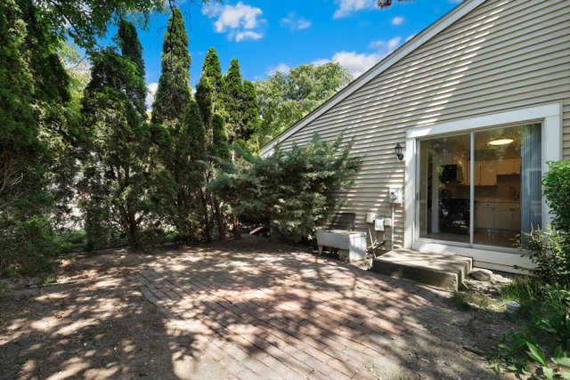 2105 Sutherland Place Hoffman Estates, IL 60169 - Photo 22 of 27 a view of a house with backyard and sitting area