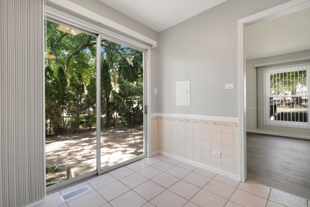 2105 Sutherland Place Hoffman Estates, IL 60169 - Photo 7 of 27 a view of a room with window
