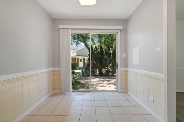 2105 Sutherland Place Hoffman Estates, IL 60169 - Photo 8 of 27 a view of an entryway with wooden floor