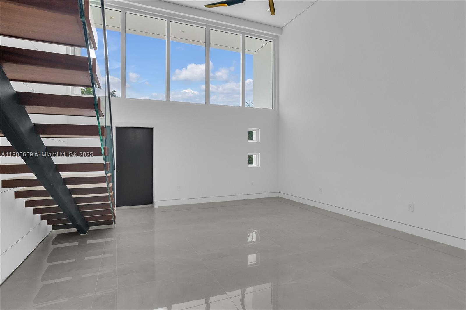 1325 Bay Drive Miami Beach, FL 33141 - Photo 11 of 49 a view of an empty room with stairs