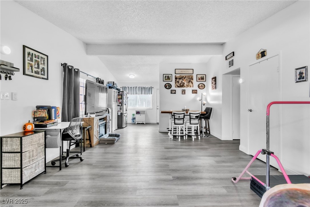 111 Maple Street Henderson, NV 89015 - Photo 5 of 37 Office featuring a textured ceiling and light wood-type flooring