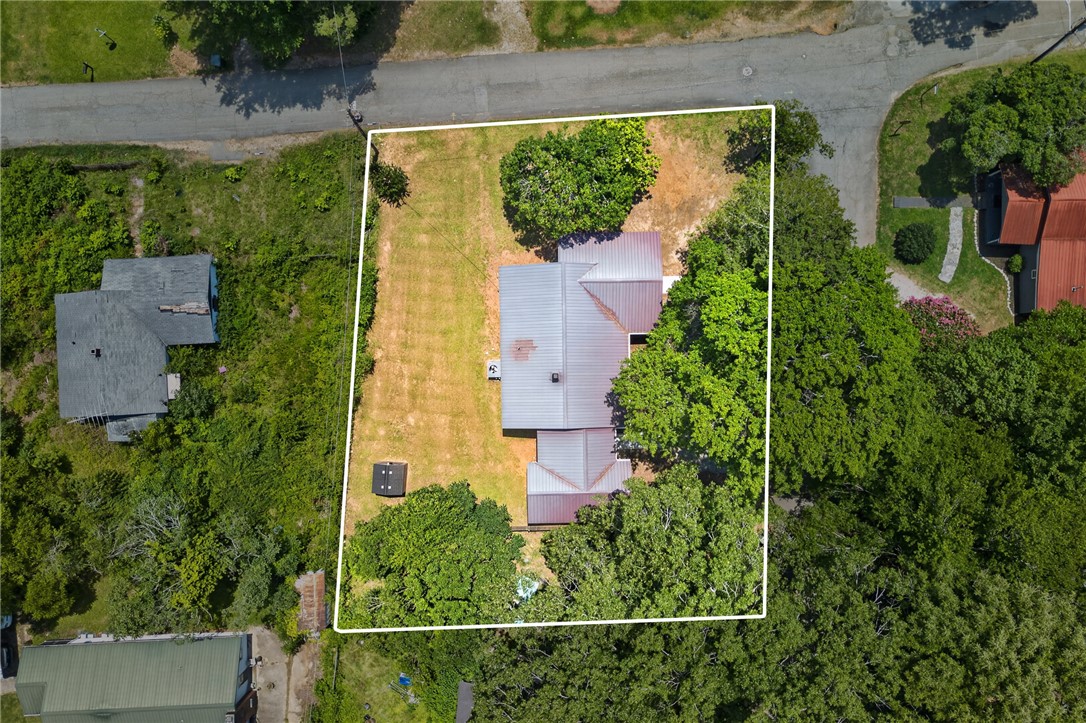 115 Pelfrey Street Seneca, SC 29672 - Photo 41 of 46 An aerial perspective reveals the expansive property lines encompassing a residence amidst verdant landscaping.