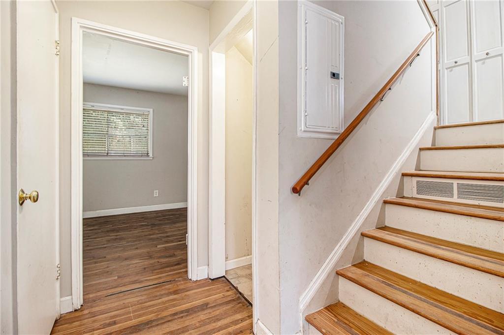 1961 Kenwood Road Southeast Smyrna, GA 30082 - Photo 18 of 33 a view of staircase with wooden floor and staircase