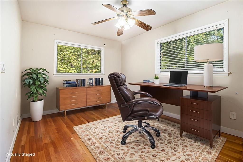 1961 Kenwood Road Southeast Smyrna, GA 30082 - Photo 20 of 33 a view of a workspace with furniture and a window