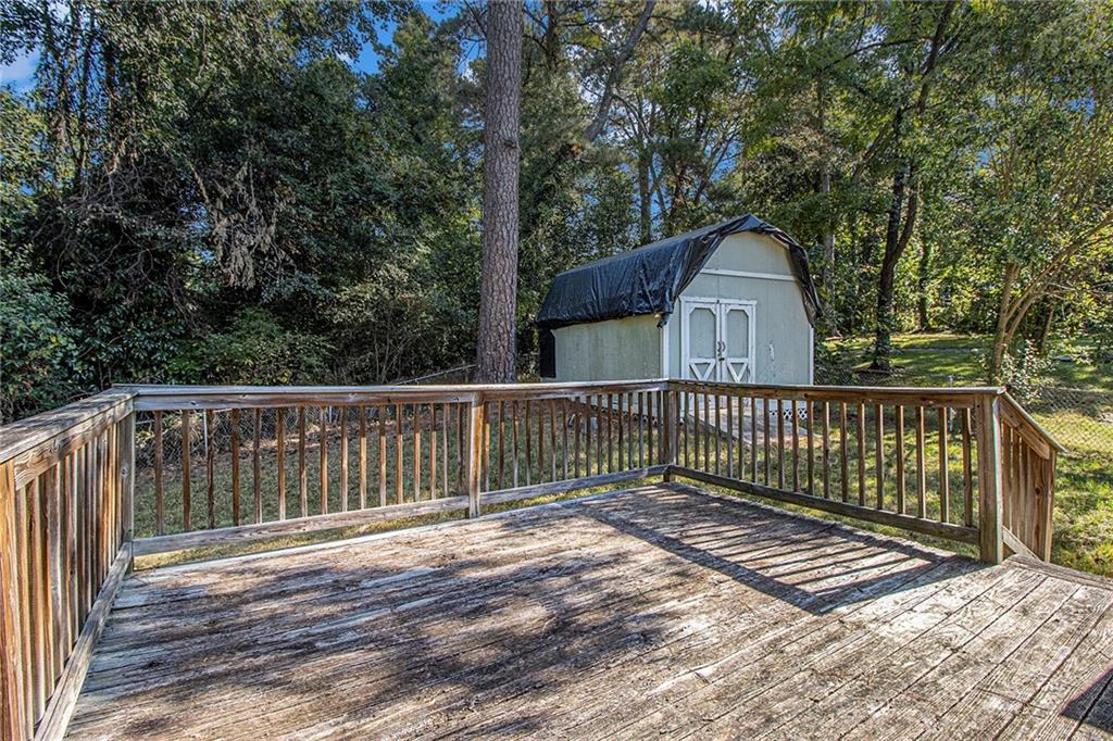 1961 Kenwood Road Southeast Smyrna, GA 30082 - Photo 27 of 33 a view of a wooden roof deck
