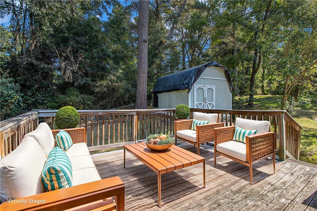 1961 Kenwood Road Southeast Smyrna, GA 30082 - Photo 29 of 33 a view of a chairs and table in the roof deck