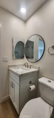 a kitchen with stainless steel appliances refrigerator sink and cabinets