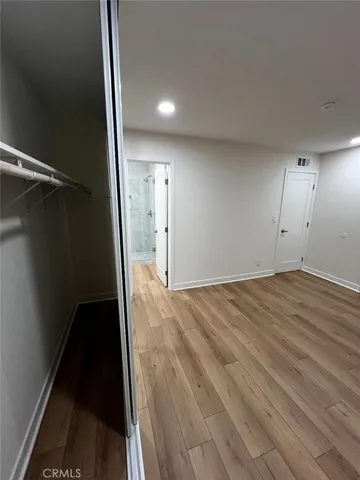 a view of street from balcony