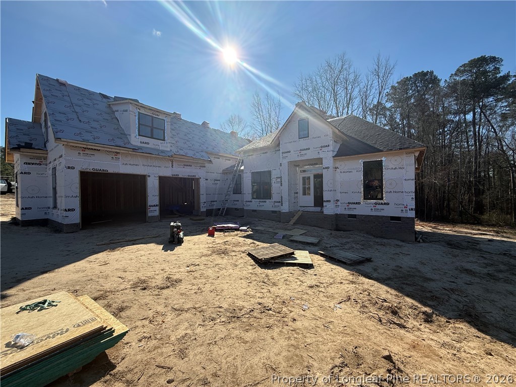219 Rachel Road Fayetteville, NC 28311 - Photo 4 of 7 a view of a house with a snow in the yard