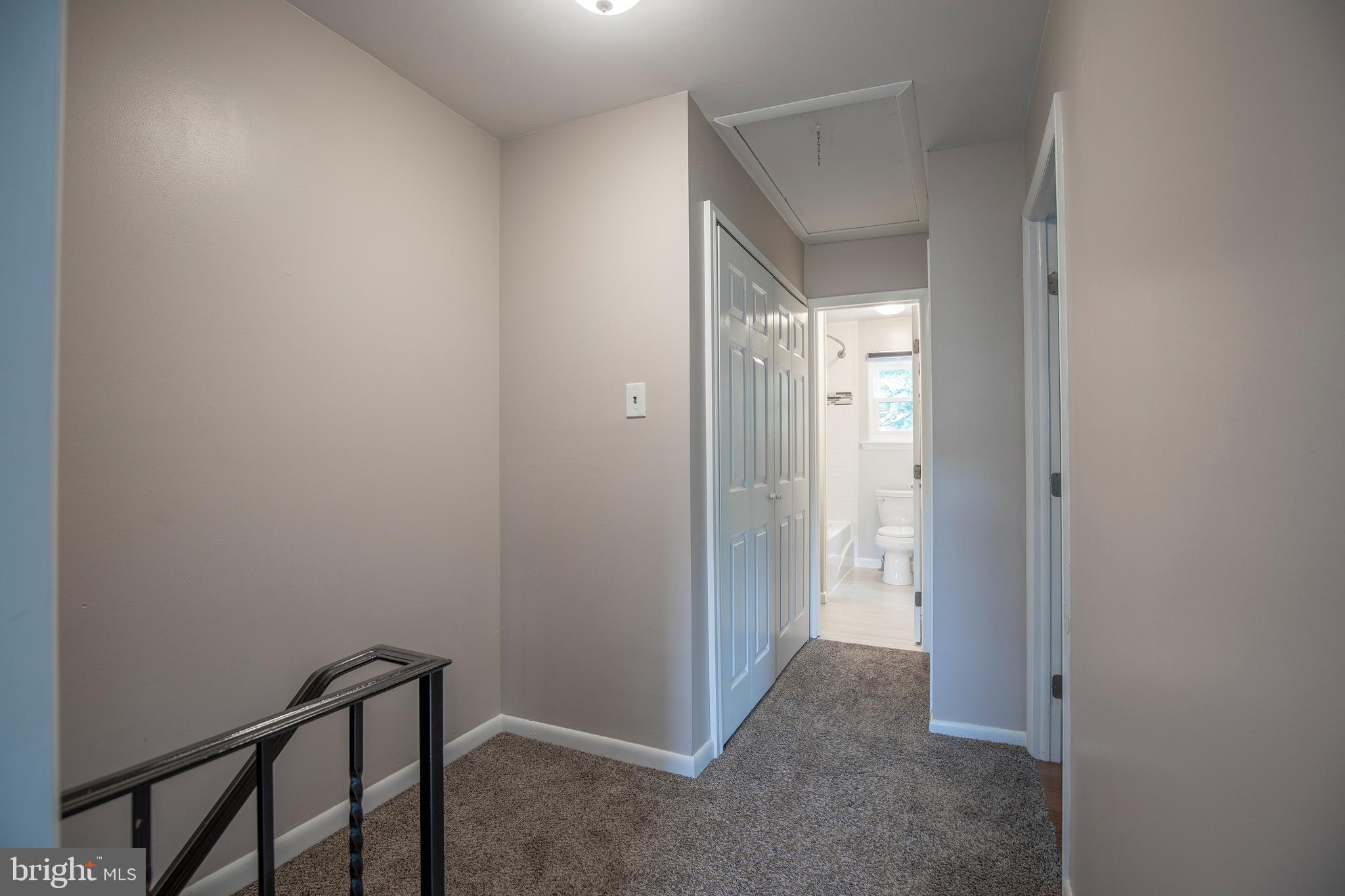11 School Road Horsham, PA 19044 - Photo 12 of 29 2nd Floor Hall with pull down stairs attic/storage