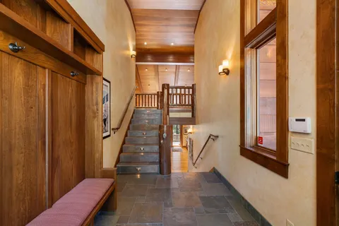 a view of a hallway with windows