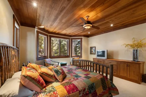 a bedroom with furniture and windows
