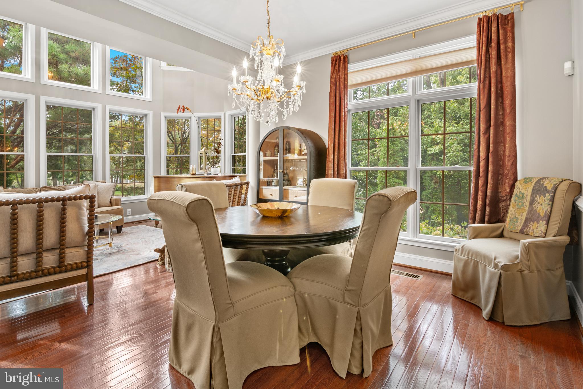 8504 Summershade Drive Odenton, MD 21113 - Photo 24 of 92 a view of a dining room with furniture wooden floor and chandelier