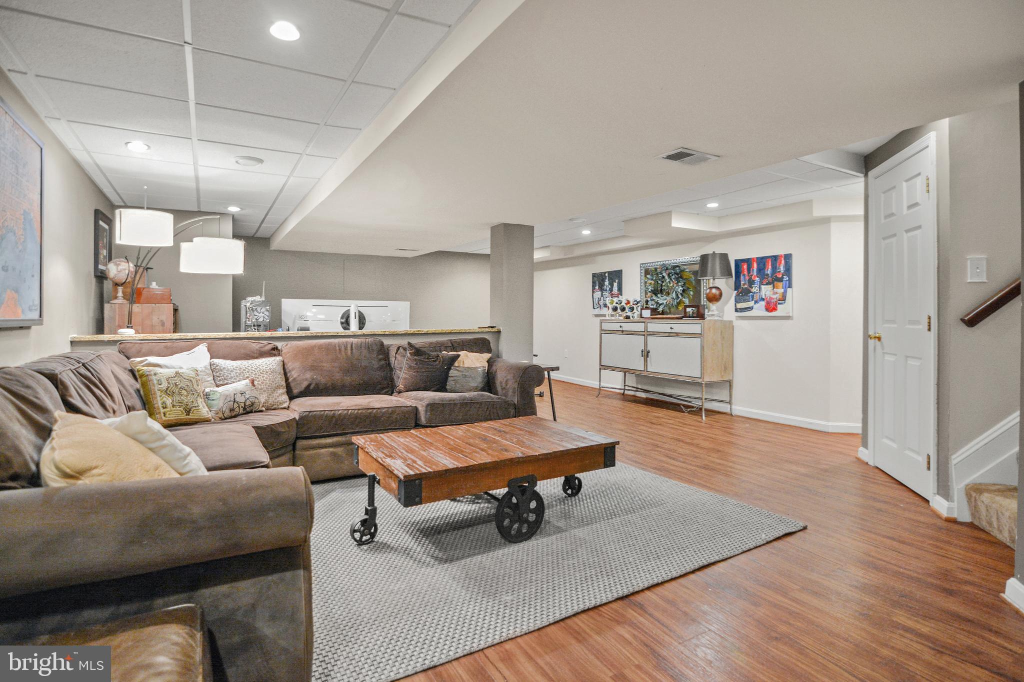 8504 Summershade Drive Odenton, MD 21113 - Photo 57 of 92 a living room with furniture and a wooden floor